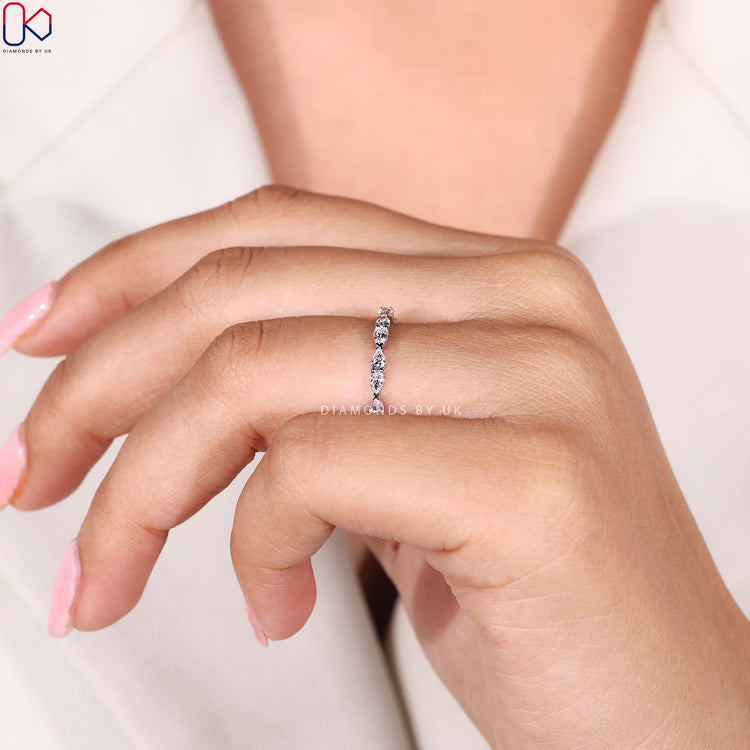 East to west pear wedding band with handmade band.
