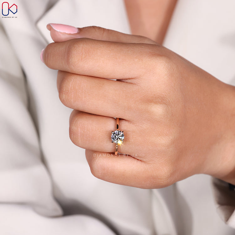 Hidden pave setting engagement ring in rose gold.
