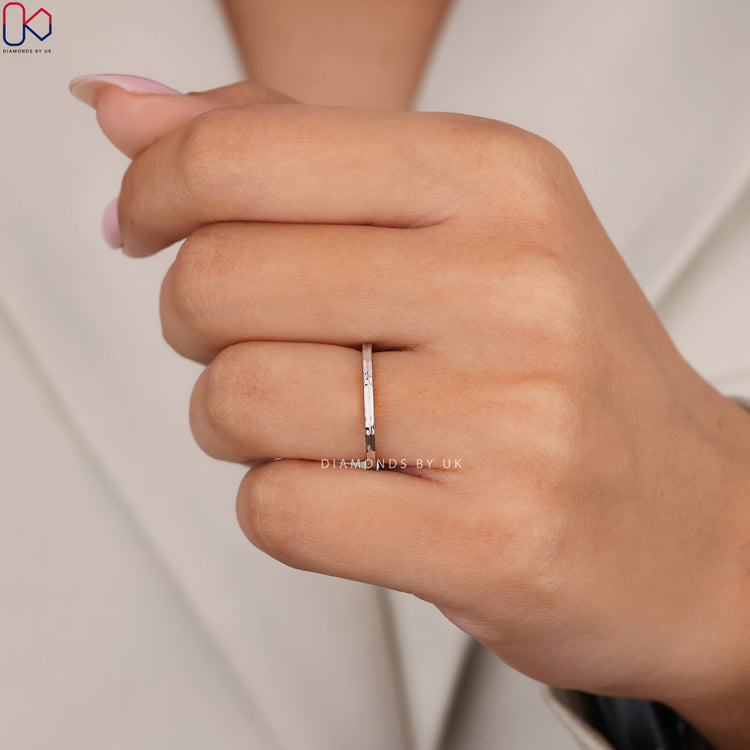 Handmade band as a hammered sterling band.
