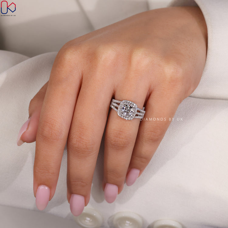 Round cut diamond ring designed with a multi row pave setting for added brilliance.