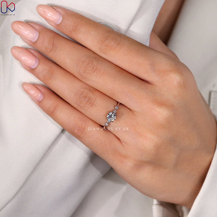 Handmade white gold engagement ring featuring a 5-stone diamond design.
