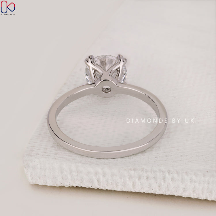 Handmade jewellery with a double claw prong setting.
