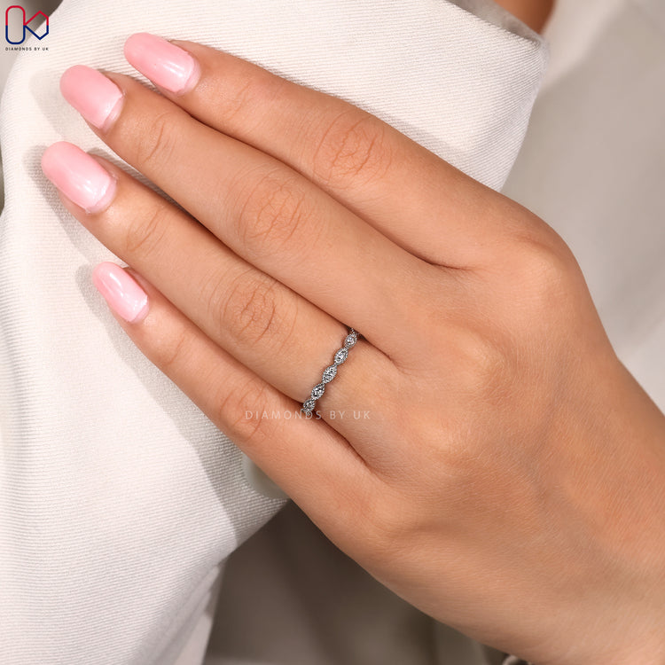 Handmade band with round diamond setting.
