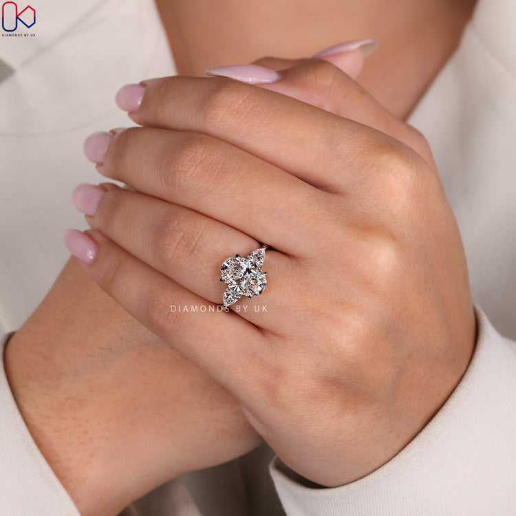 Customize ring with a three-stone design.
