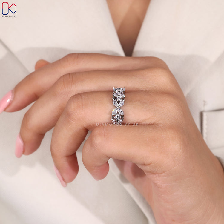 Custom diamond band with marquise and round stones.
