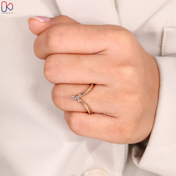 Buy wedding band with marquise and round diamonds.
