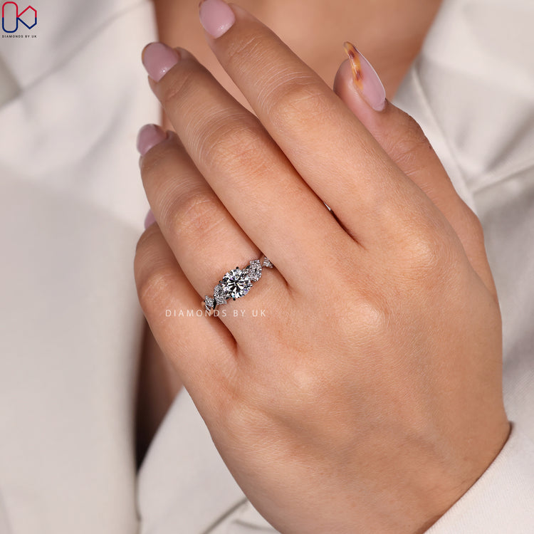 White gold engagement ring with round cut diamond.
