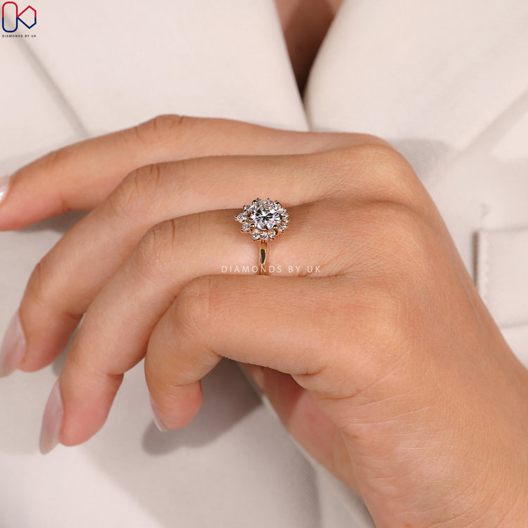 Lab grown round ring with cluster halo design.
