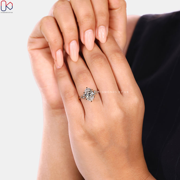 Oval cut diamond ring with vintage style and muse setting.  
