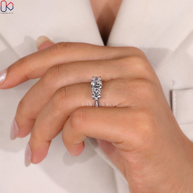 Lab grown round ring with tapered pavé shank.
