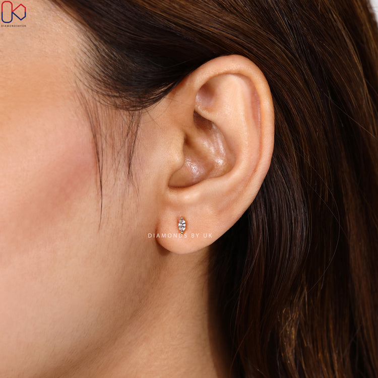 Marquise solitaire stud earrings with prong setting.