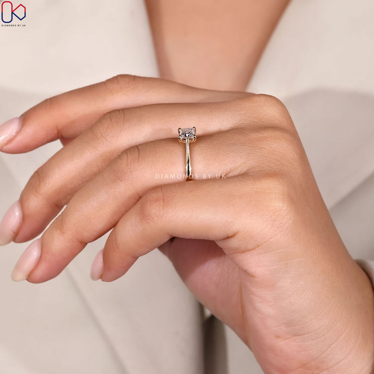 Cathedral setting princess cut diamond ring style.