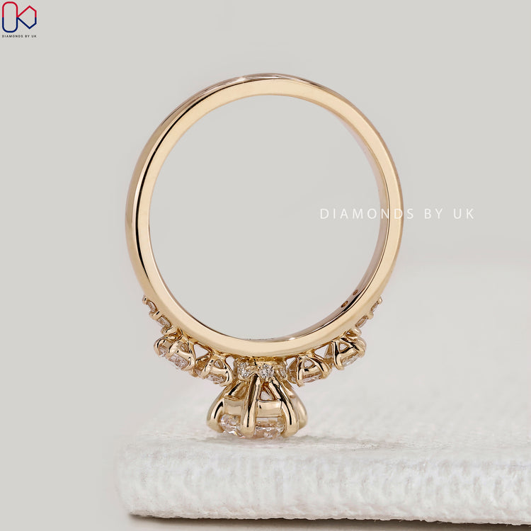 Round cut ring with claw prong setting style.