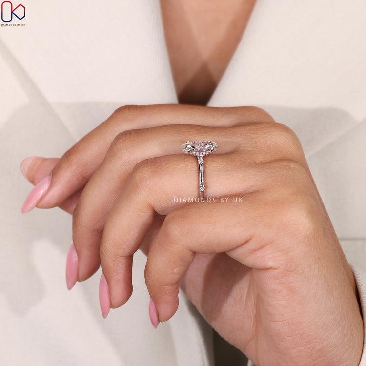 IGI certified marquise diamond ring with hidden halo.
