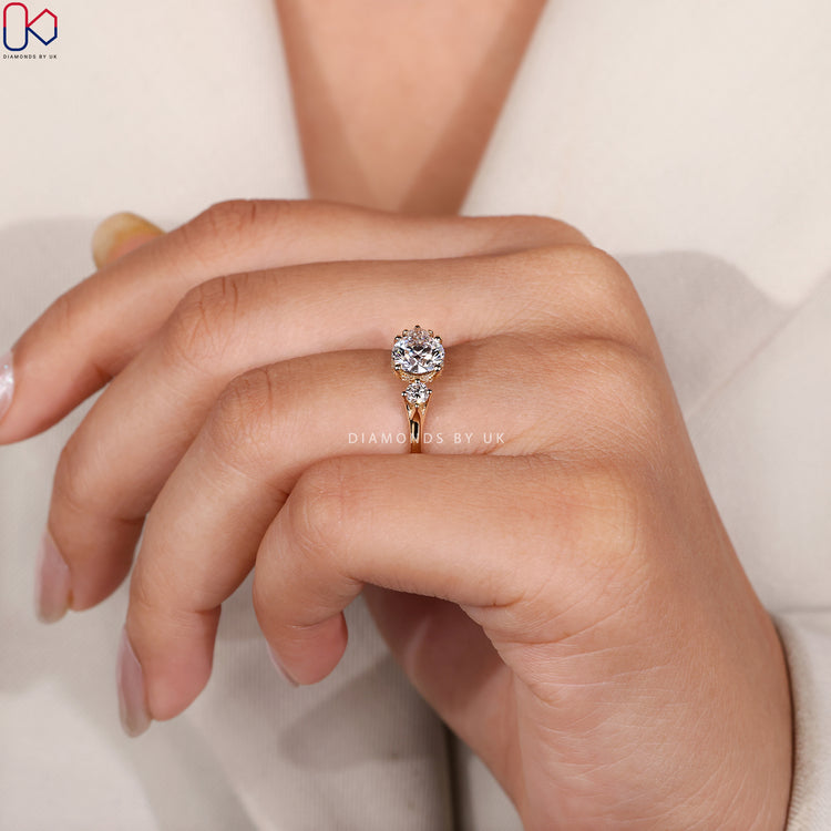 Handmade round cut ring with open gallery design.
