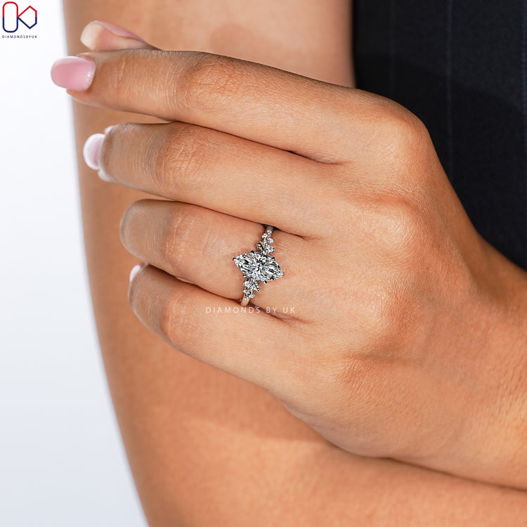 Nature inspired marquise ring with cathedral setting.
