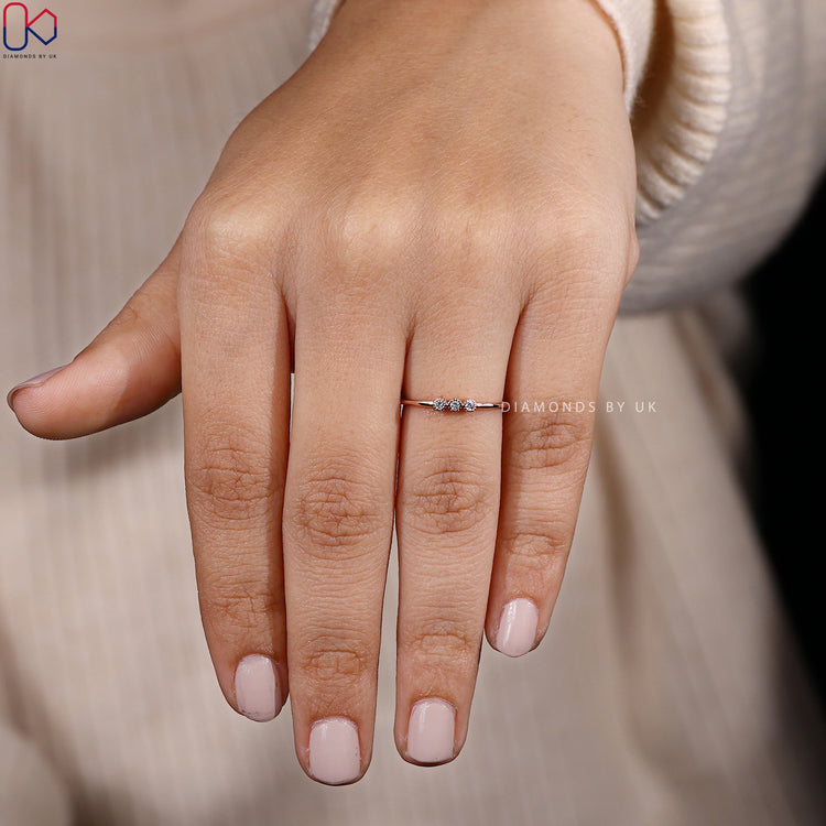 Round diamond wedding band with bezel milgrain style.
