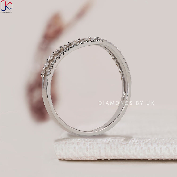 Lab grown round diamond band with chevron rows.
