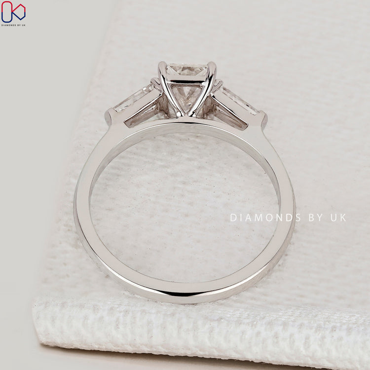 IGI Certified pear diamond three stone ring.