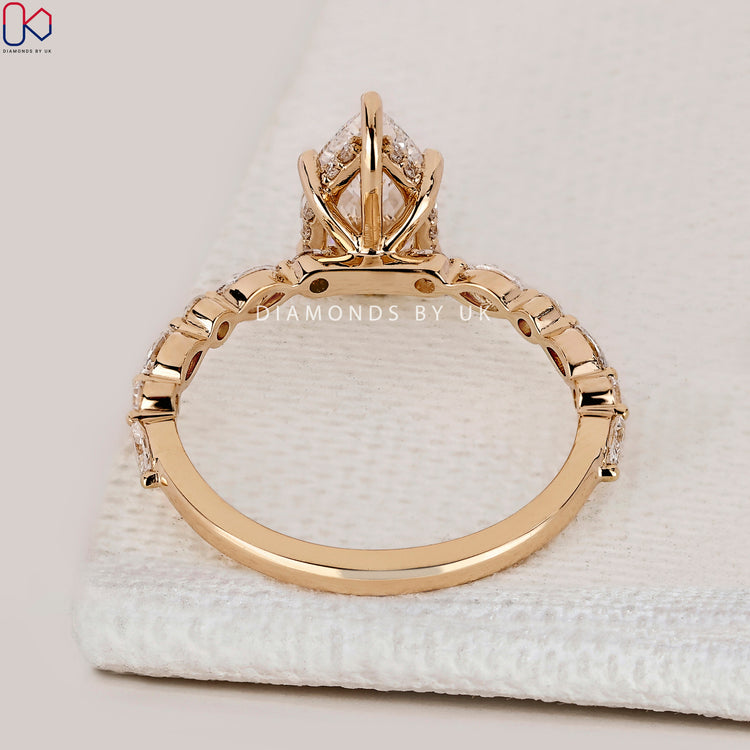 IGI Certified pear cut diamond engagement ring.
