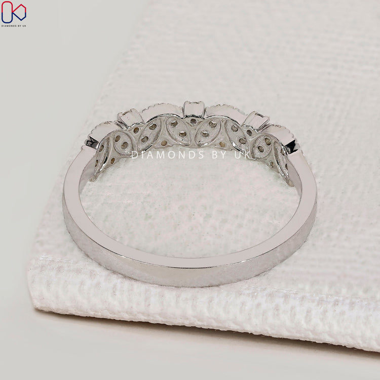 Handmade round diamond band with half eternity style.