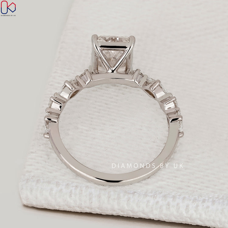 IGI Certified radiant cut diamond ring with pavé.