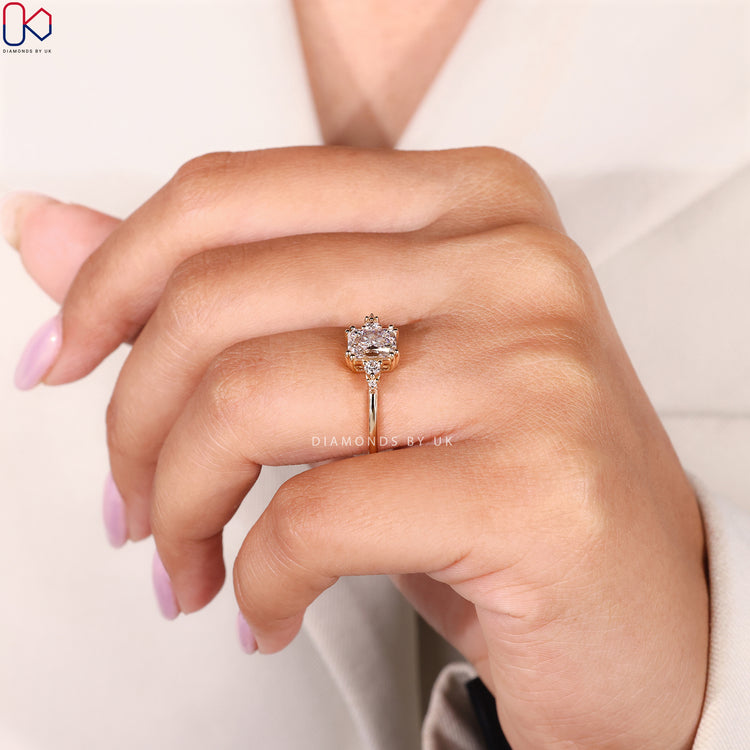 Lab grown radiant cut ring with side stone style.