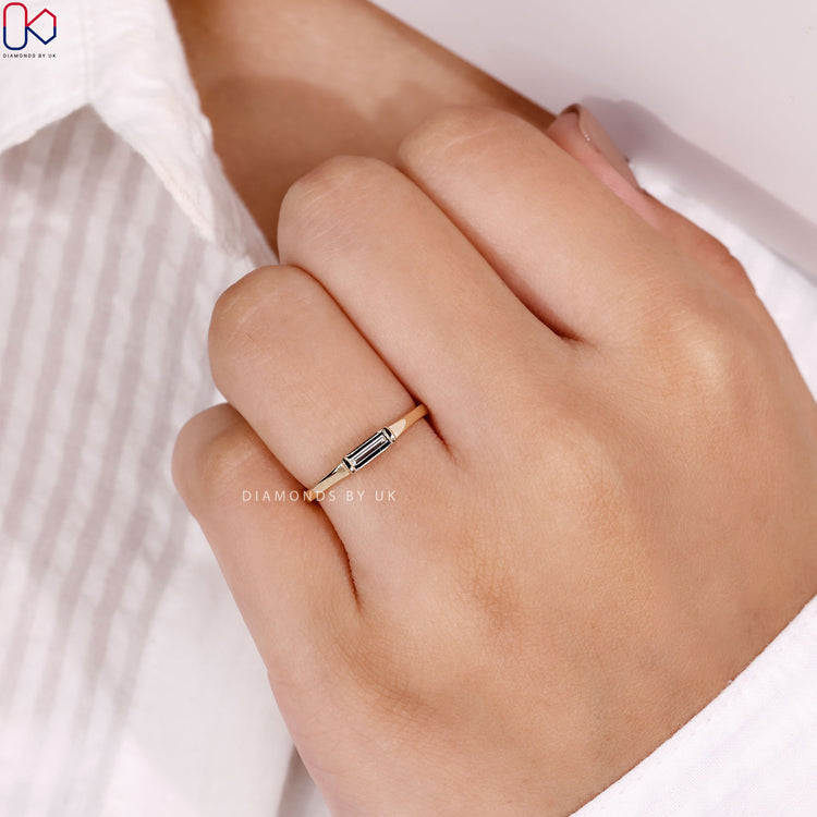 Lab grown baguette cut wedding band with solitaire style.