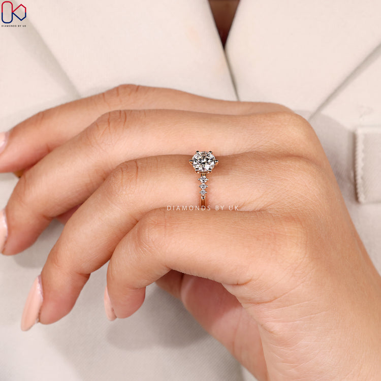 Lab grown round cut ring with seven stone design.