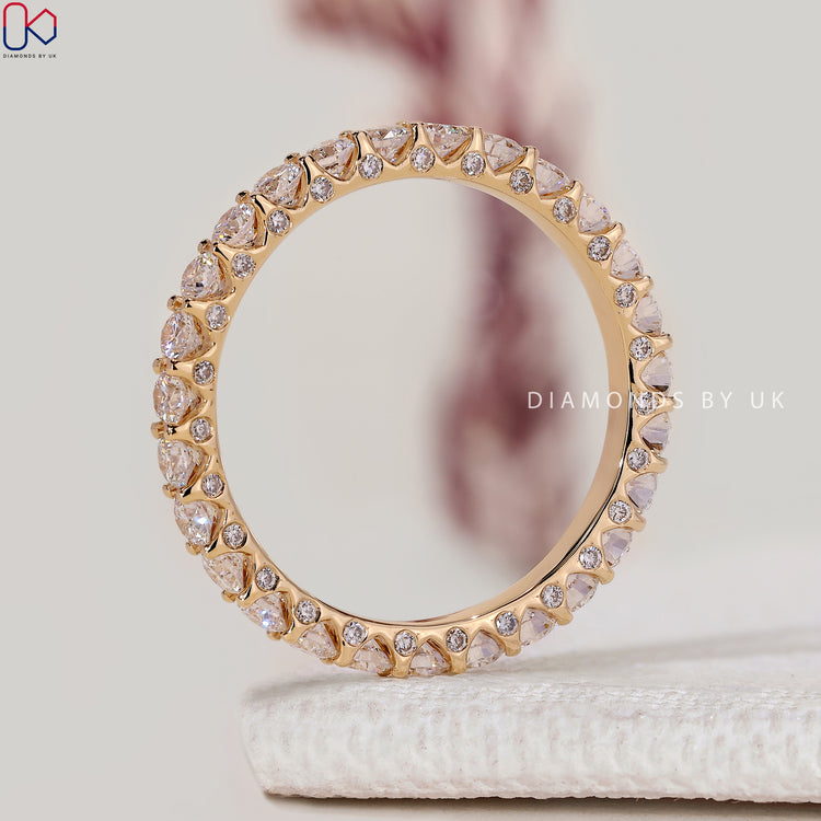 Handmade round diamond band with full eternity setting.
