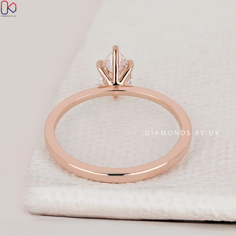 IGI Certified pear cut solitaire diamond ring.
