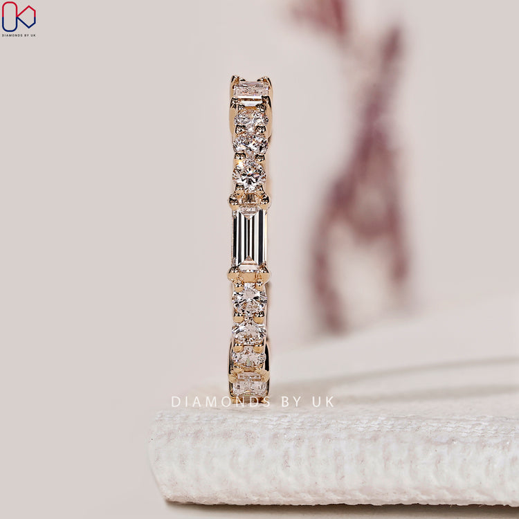 Handmade baguette and round cut diamond wedding band.