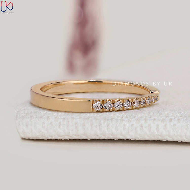 Handmade open gap band with round lab grown diamonds.