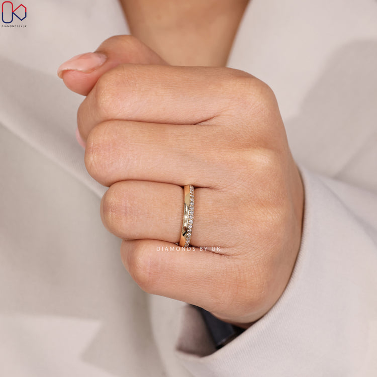 Lab grown round diamond band with knife edge design.

