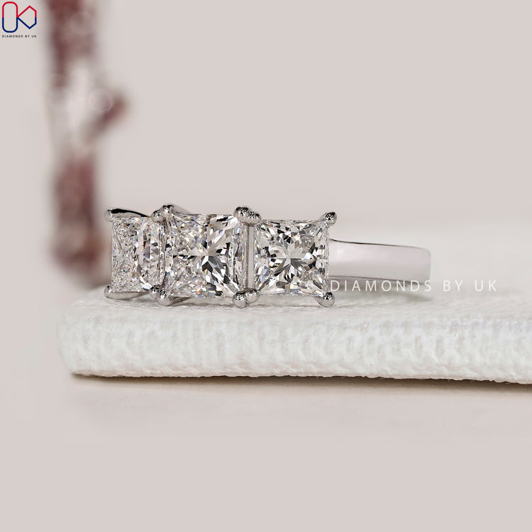 Princess cut lab grown diamond engagement ring.