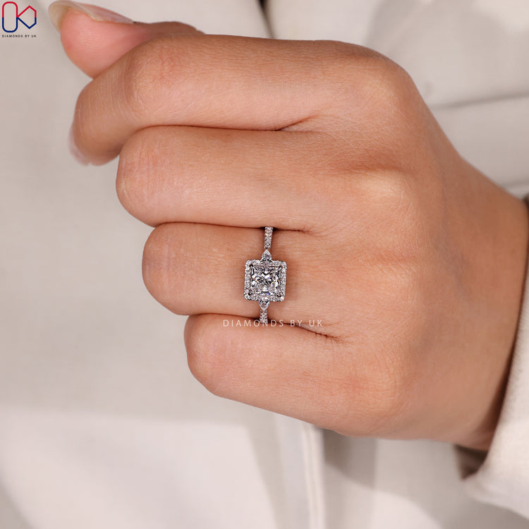 Cathedral princess ring with four claw prong setting.
