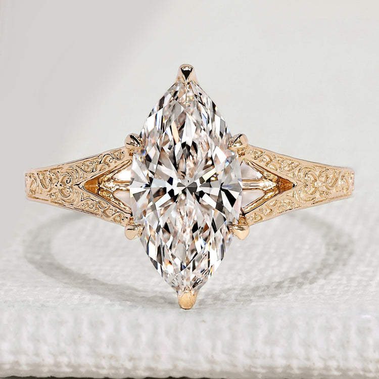 Marquise cut diamond ring with vintage Art Deco style.
