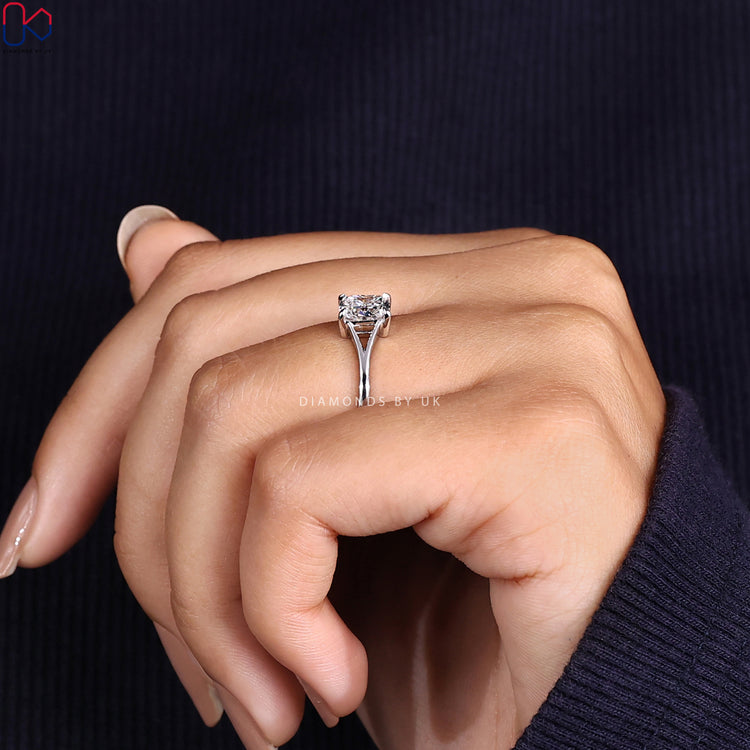 Cushion cut solitaire ring by Diamondsbyuk.