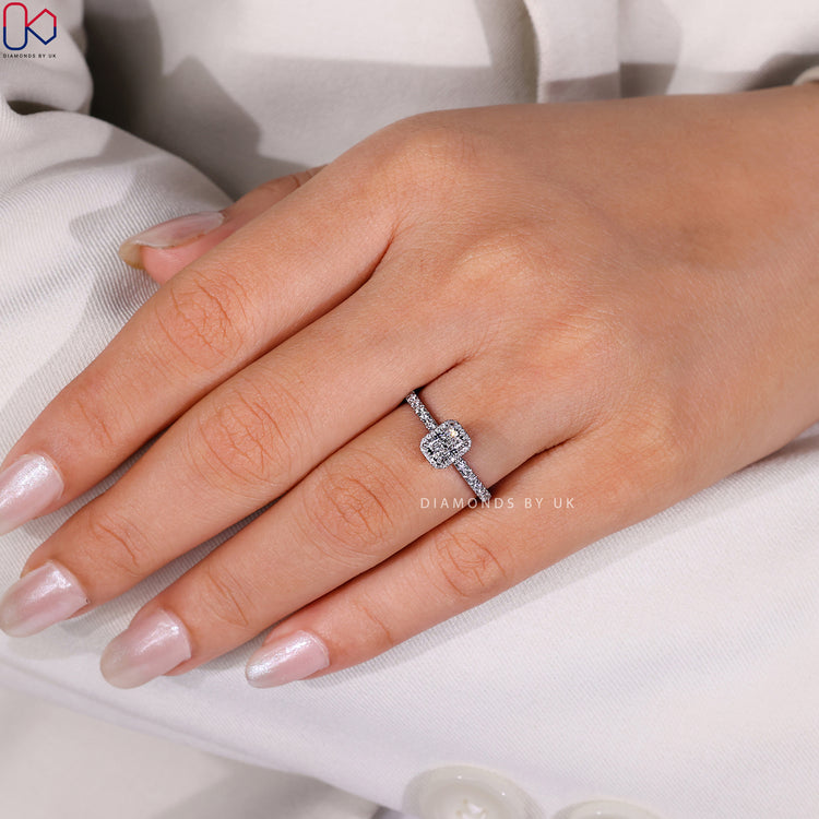 Lab grown radiant cut ring with pavé diamonds.