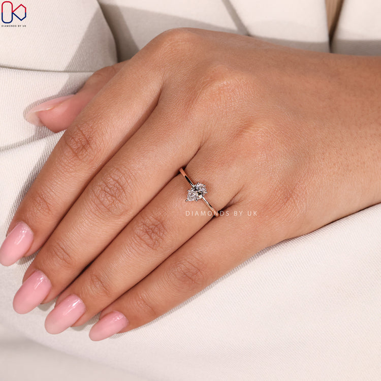 Lab grown pear cut ring with six prong style.