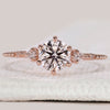 Five stone diamond ring in rose gold.
