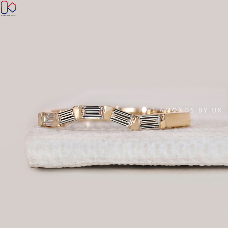 Buy wedding band with baguette diamond wedding band.
