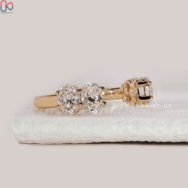 Handmade jewellery with oval diamond wedding band.
