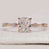 Elongated cushion engagement ring in yellow gold.
