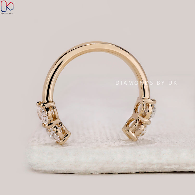 Shared prong wedding band from handmade jewellery.
