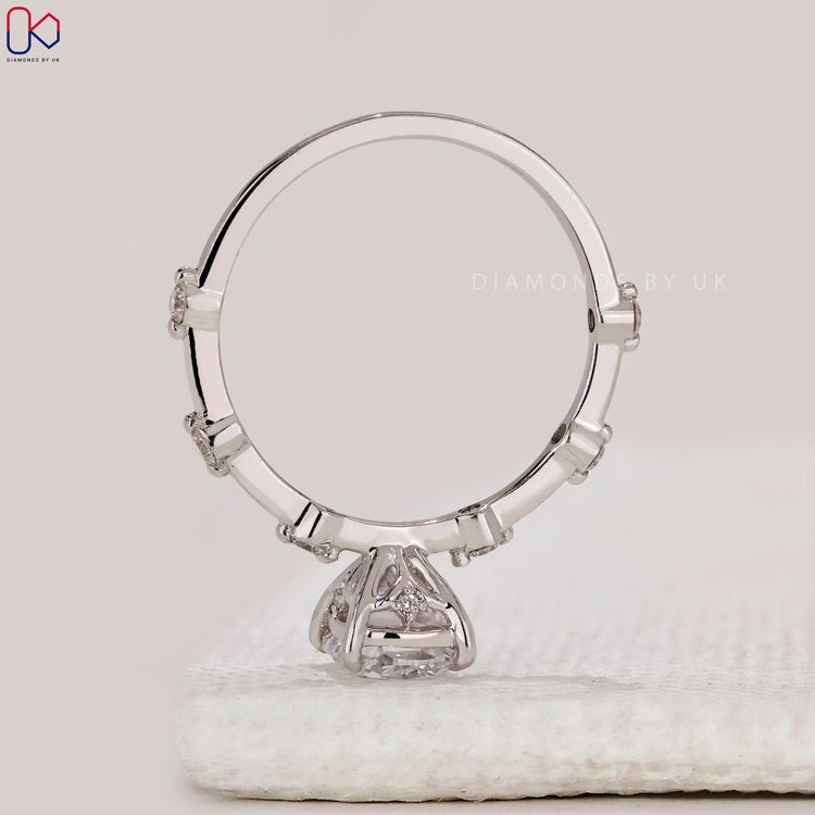 Lab grown cushion cut diamond engagement ring.
