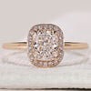 Hidden halo ring with elongated cushion cut diamond.
