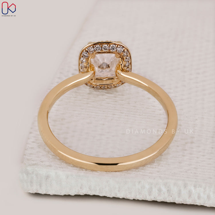Buy hidden halo diamond engagement ring online.
