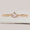 Solitaire diamond engagement ring with a classic single stone design.
