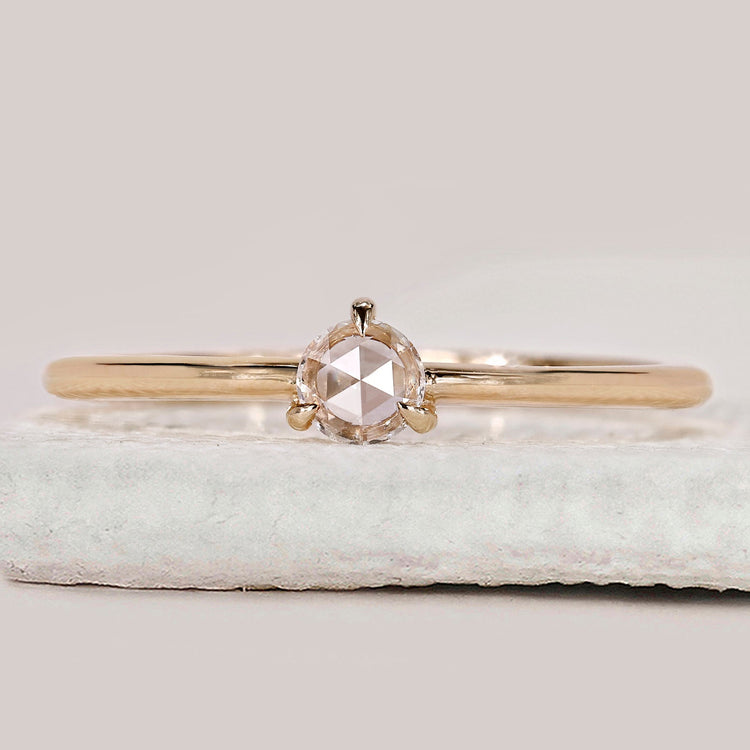Solitaire diamond engagement ring with a classic single stone design.
